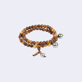 Armband/ Halskette aus braunem Sandelholz mit Tahiti- und Südseeperlen - Sandal Bond